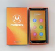A boxed as new Motorola Moto E5 Plus (XT1924-2) 16GB in Flash Grey (Box opened. UK plug and USB cabl