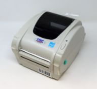 An as new TSC TDP-247 Direct Thermal Desktop Label Printer (PSU included. No Box).