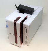 A pre-owned Evolis Primacy ID Card Printer (PSU and sample cards included) (Tested, working)..