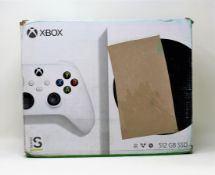 A boxed as new Microsoft Xbox Series S 512GB Console (P/N: RRS-00007 M/N: 1883) (Box opened, damage