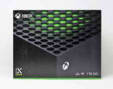 A boxed as new Microsoft Xbox Series X 1TB Console (M/N: RRT-00007) (Box sealed).