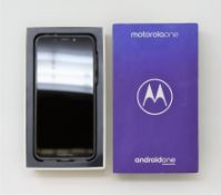 A boxed as new Motorola One (XT1941-4) 64GB in Black (Box opened. UK plug and USB cable included) (C