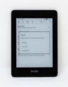 A pre-owned Amazon Kindle 10th Gen in Black.