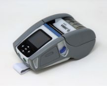 A pre-owned Zebra ZQ610 Portable Mobile Label Printer (M/N: ZQ61-HUWAE00-00) (PSU included) (Tested,