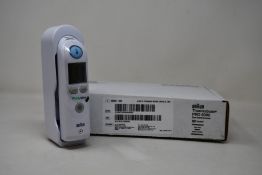 A boxed as new Braun ThermoScan PRO 6000 ear thermometer (#REF: 06000-200).