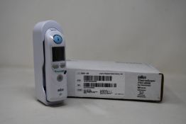 A boxed as new Braun ThermoScan PRO 6000 ear thermometer (#REF: 06000-200).