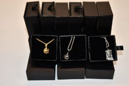 Fifteen items of assorted Haraves jewellery to include 10x Globes and 5x Jesus.