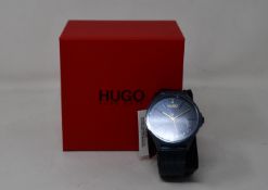 A gents as new Hugo Boss Smash wrist watch.