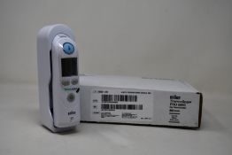 A boxed as new Braun ThermoScan PRO 6000 ear thermometer (#REF: 06000-200).