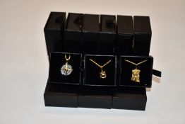 Fifteen items of assorted Haraves jewellery to include 5x Globes, 4x Compass and 6x Jesus.