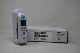 A boxed as new Braun welch allyn ThermoScan PRO 6000 with cradle.