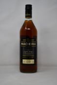 Twelve bottles of Macieira Royal Spirit brandy (1ltr) (Over 18s only).