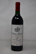 A bottle of 1989 Chateau Montrose Saint-Estephe J L Charmolüe (Over 18s only).
