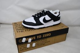 A pair of women's as new Nike Low Next Nature (UK 5.5).