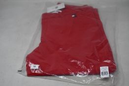 A pair of as new Tommy Hilfiger Herren equestrian breeches in primary red (XL - RRP €199).