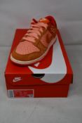 A pair of women's as new Nike Dunk Low NH (UK 5).