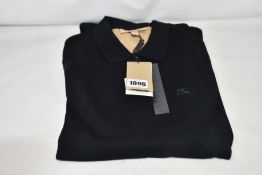 Three as new Burberry polo shirts in black (XL - RRP £79 each).