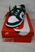 A pair of as new Nike Dunk Low Retro (UK 11).