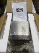 A Chefmaster HEB081 Cast Iron Square Pattern Waffle Iron with Drip Tray.