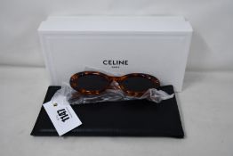 A pair of as new Celine - CL40193I shiny spotted Havana/Smoke Cat Eye sunglasses (RRP $400).