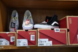 Five pairs of as new Vans footwear.