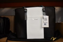 An as new Nova Harley Luxury Miami leather changing bag.