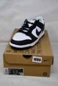 A pair of women's as new Nike Low Next Nature (UK 7.5).