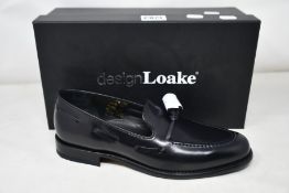 A pair of men's as new Design Loake shoes (Size 8+).