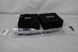 Four gents assorted as new Hugo Boss bracelets; brown leather bracelet 1580149M (RRP £69) and