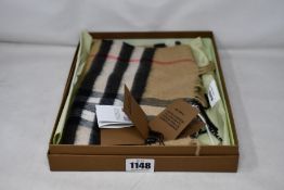 An as new Burberry giant check cashmere scarf in box.