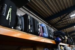 A quantity of pre-owned empty suitcases/holdalls.