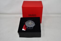 A gents as new Hugo Boss Smash wrist watch.