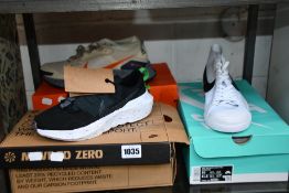 Three pairs of as new Nike trainers; SB BLZR Court Mid (UK 9), Pegasus Trail GTX (UK 11.5) and