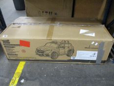 A boxed as new Xootz Mercedes AMG GLA45 ride-on car.