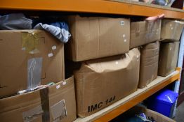Eight boxes of pre-owned clothing and related items.