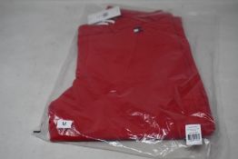 A pair of as new Tommy Hilfiger Herren equestrian breeches in primary red (L - RRP €199).
