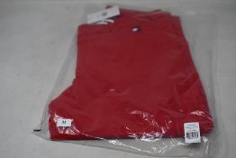 A pair of as new Tommy Hilfiger Herren equestrian breeches in primary red (XS - RRP €199).