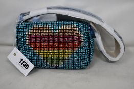 An as new Kurt Geiger Party Pochette bag in blue.