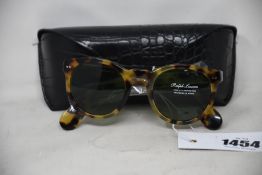 A pair of as new Ralph Lauren sunglasses.