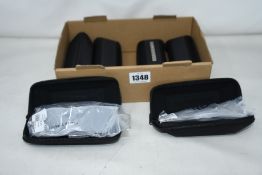 Six pairs of as new Land Rover glasses frames with cases.