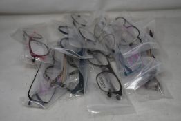 Twelve pairs of assorted as new Booth & Bruce glasses frames.