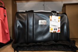 An as new Nova Harley Manhattan blackberry leather changing bag.