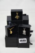Fifteen assorted Haraves jewellery to include 5x Compass, 5x Globes, 5x Jesus.