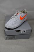 A pair of youths as new Nike Air Force 1 LV8 GS (UK 5).