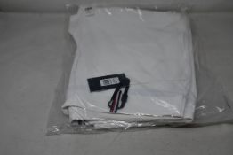 A pair of as new Tommy Hilfiger Herren equestrian breeches in optic white (S - RRP €199).