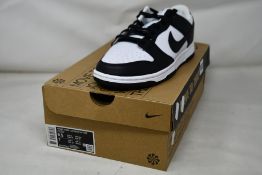 A pair of women's as new Nike Low Next Nature (UK 6).