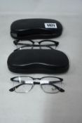 Two pairs of assorted as new Ray Ban glasses frames.