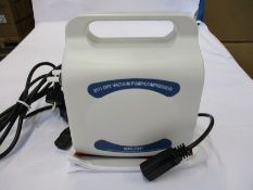 A boxed as new Welch 2511C-02 Dry Vacuum Pump/Compressor.