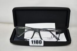 A pair of as new Starck glasses frames.