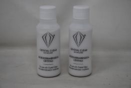 A box of as new Crystal Clear Skincare microdermabrasion crystals (52 bottles per box, 85g